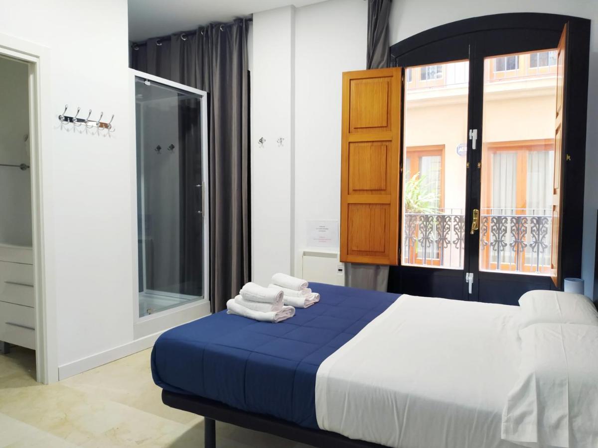فندق Flats Friends Plaza De La Reina فالنسيا المظهر الخارجي الصورة